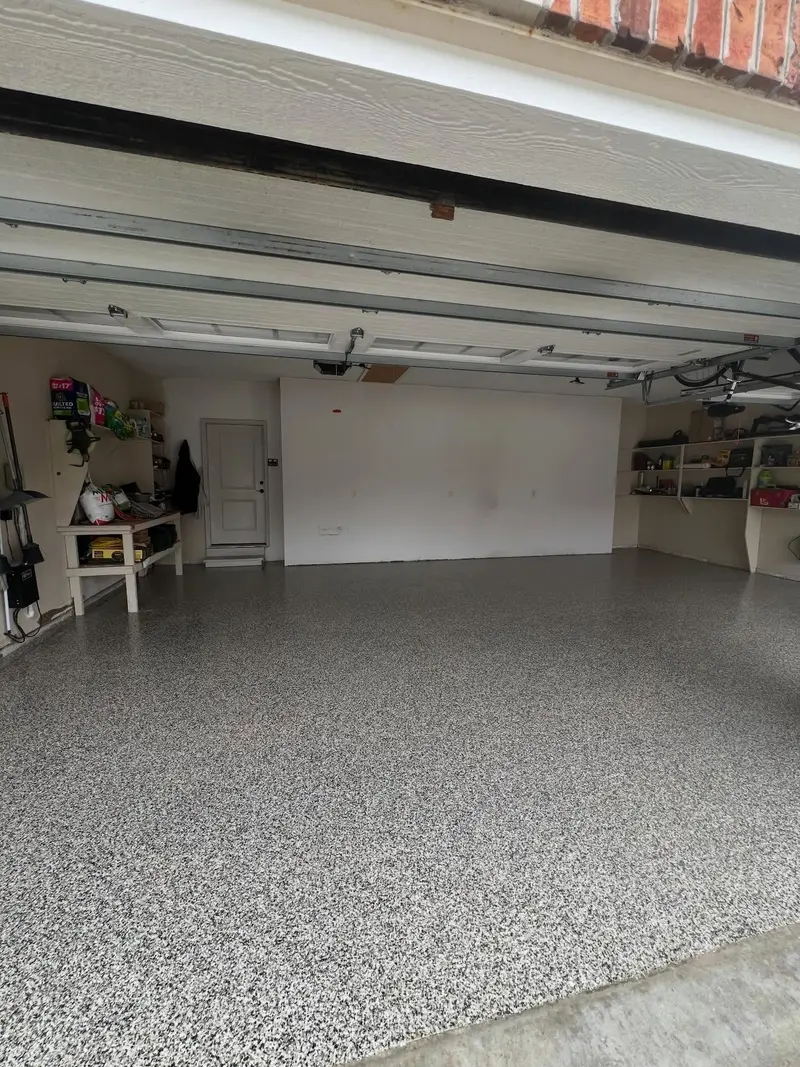 Professional epoxy garage floor coating by Elite Coatings — full flake system, Edwardsville IL